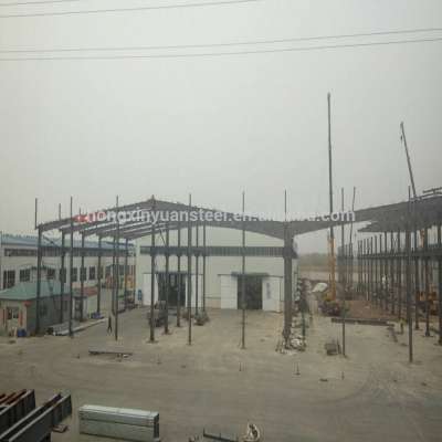 Low cost light steel structure building pre fabricated warehouse car workshop design