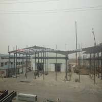 Low cost light steel structure building pre fabricated warehouse car workshop design